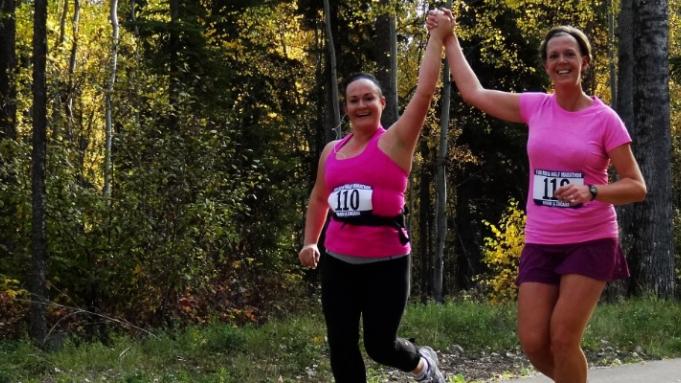 Women running in community race