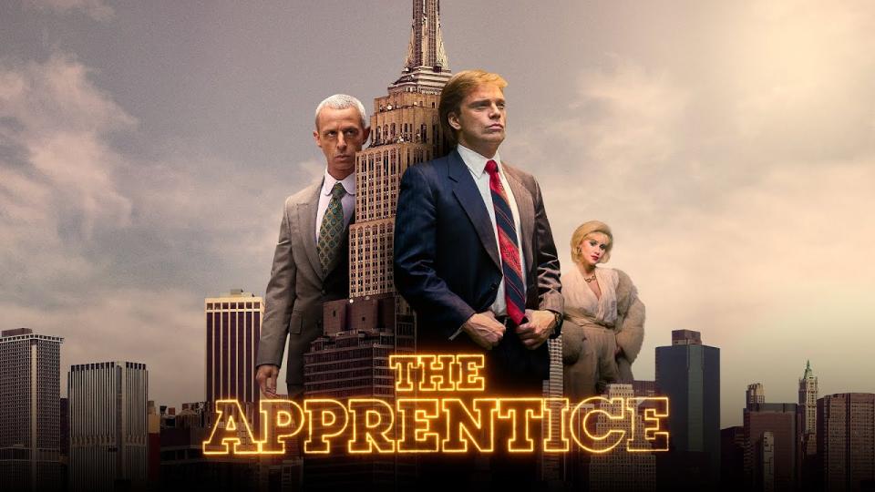 Three people in business attire in front of a city skyline.