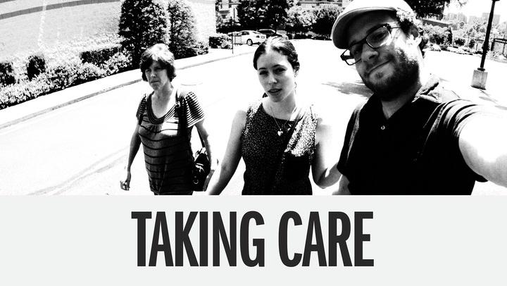 Black and white photo of three people walking outside.